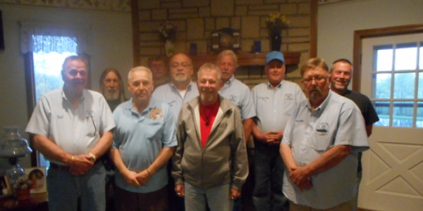 event sponsors group of men standing